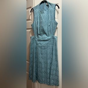 Beautiful, partially open back dress. Never worn.